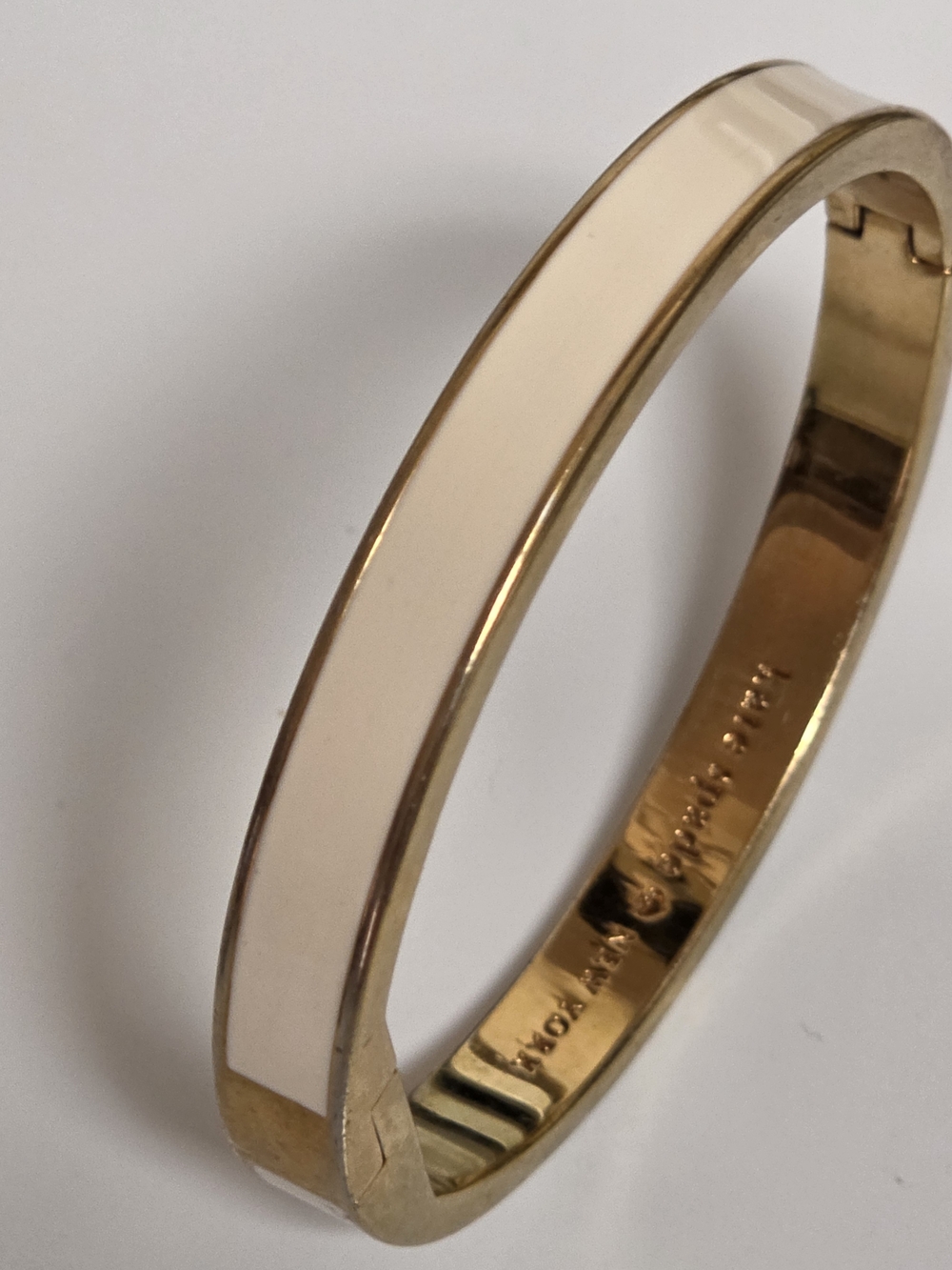 kate spade Gold Tone Bangle with Cream Enamel